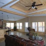 Huge windows surround the living area in the Mallards Landing Lodge in Rockwall, Texas