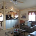 Cabin with southern yellow pine and metal interior accents by Recreational Resort Cottages in Rockwall, Texas