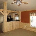 Ranch package with southern yellow pine wainscot in living room - on display in Rockwall, Texas